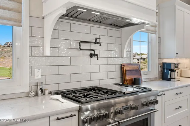 a view of a dining area with furniture and wooden floor