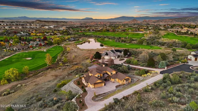 a front view of a house with outdoor seating