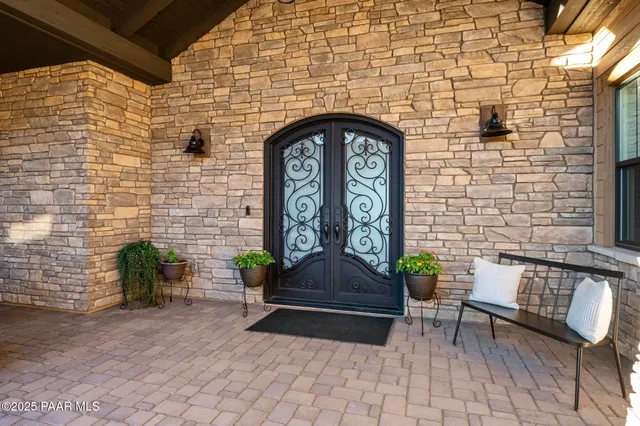 a view of an entryway with wooden floor
