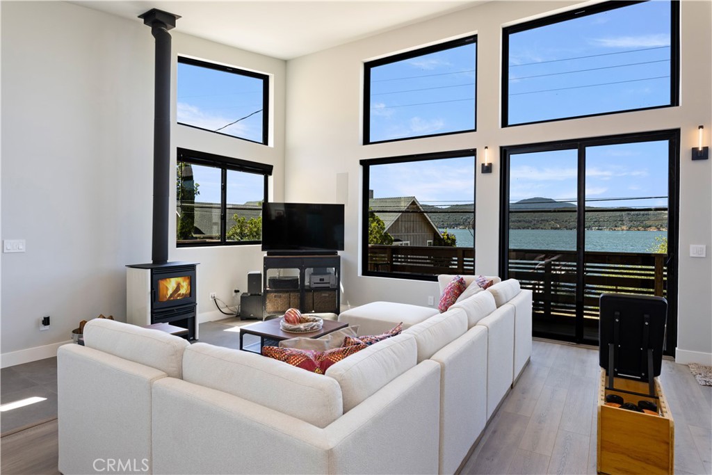 12630 Lakeshore Drive Clearlake, CA 95422 - Photo 13 of 73 a living room with furniture fireplace and flat screen tv