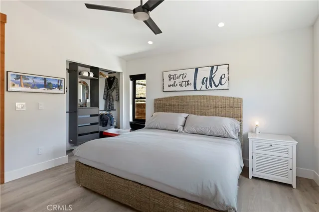a kitchen with stainless steel appliances kitchen island granite countertop a sink and cabinets
