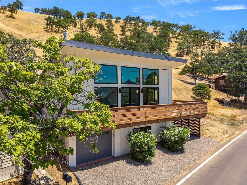 12630 Lakeshore Drive Clearlake, CA 95422 - Photo 4 of 73 a view of a house with a window