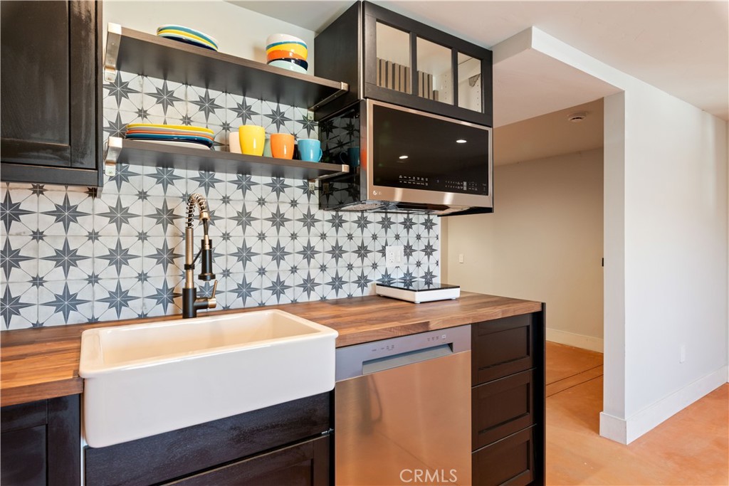12630 Lakeshore Drive Clearlake, CA 95422 - Photo 41 of 73 a bathroom with a sink and a mirror