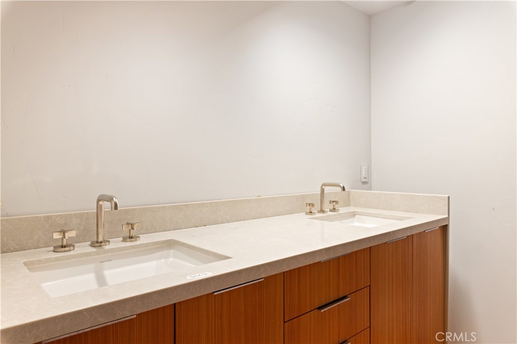 12630 Lakeshore Drive Clearlake, CA 95422 - Photo 45 of 73 a bathroom with a sink and a mirror