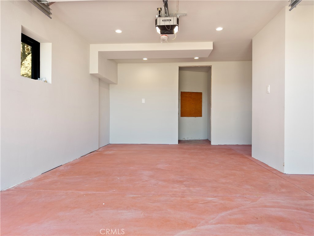 12630 Lakeshore Drive Clearlake, CA 95422 - Photo 47 of 73 a view of an empty room with wooden floor
