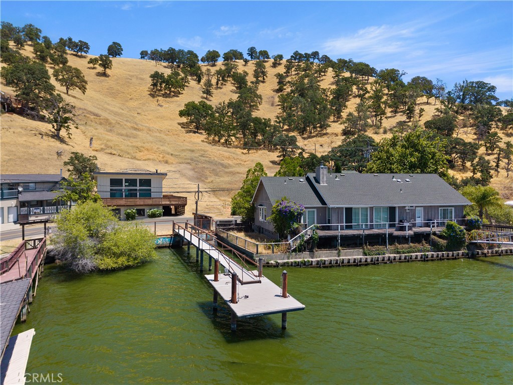 12630 Lakeshore Drive Clearlake, CA 95422 - Photo 58 of 73 an aerial view of a house with swimming pool garden and lake view