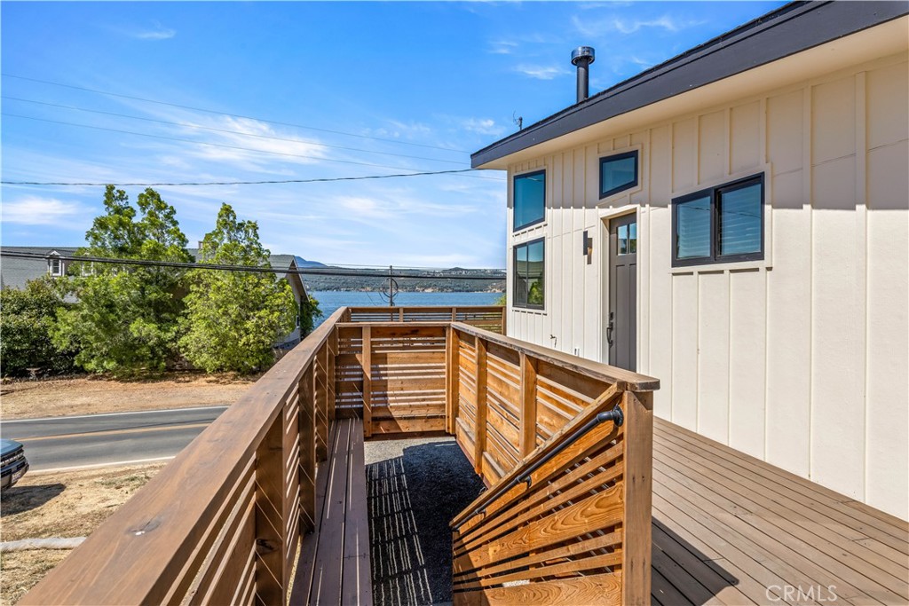 12630 Lakeshore Drive Clearlake, CA 95422 - Photo 7 of 73 a view of balcony with wooden floor and fence