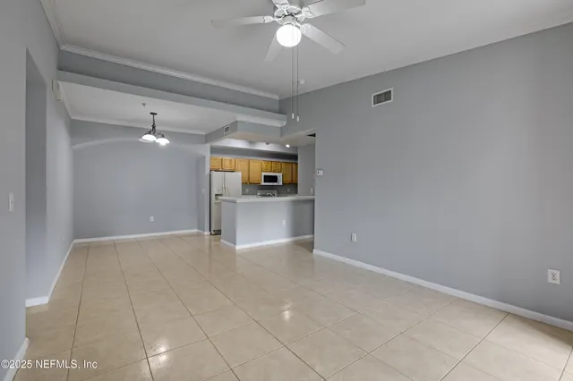 a view of a kitchen with a sink and a stove top oven