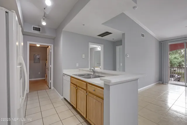 a bathroom with a sink a vanity and a mirror