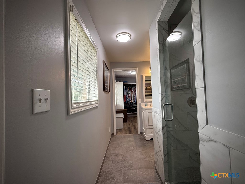 2701 Leary Lane Victoria, TX 77901 - Photo 26 of 48 workspace with wooden floor and windows