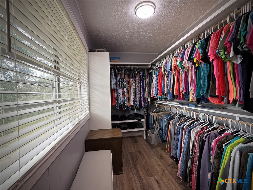2701 Leary Lane Victoria, TX 77901 - Photo 29 of 48 a view of walk in closet with clothes and shoes