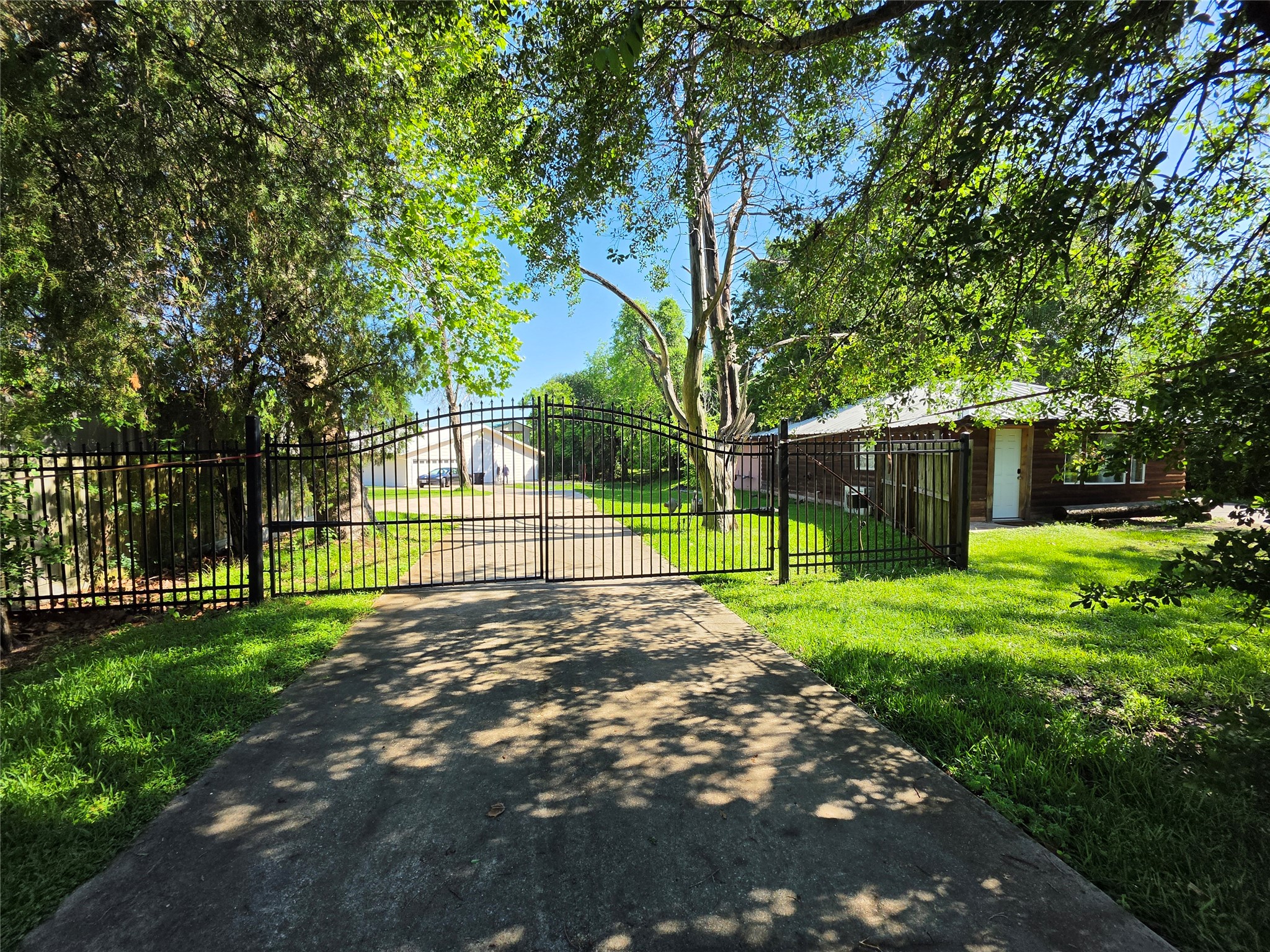 206 Elm Street Highlands, TX 77562 - Photo 47 of 49 gated entrance to the property.