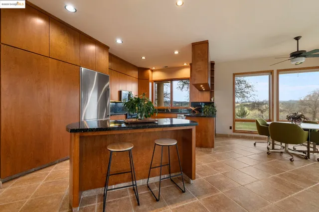 a bedroom with a bed and a cabinets