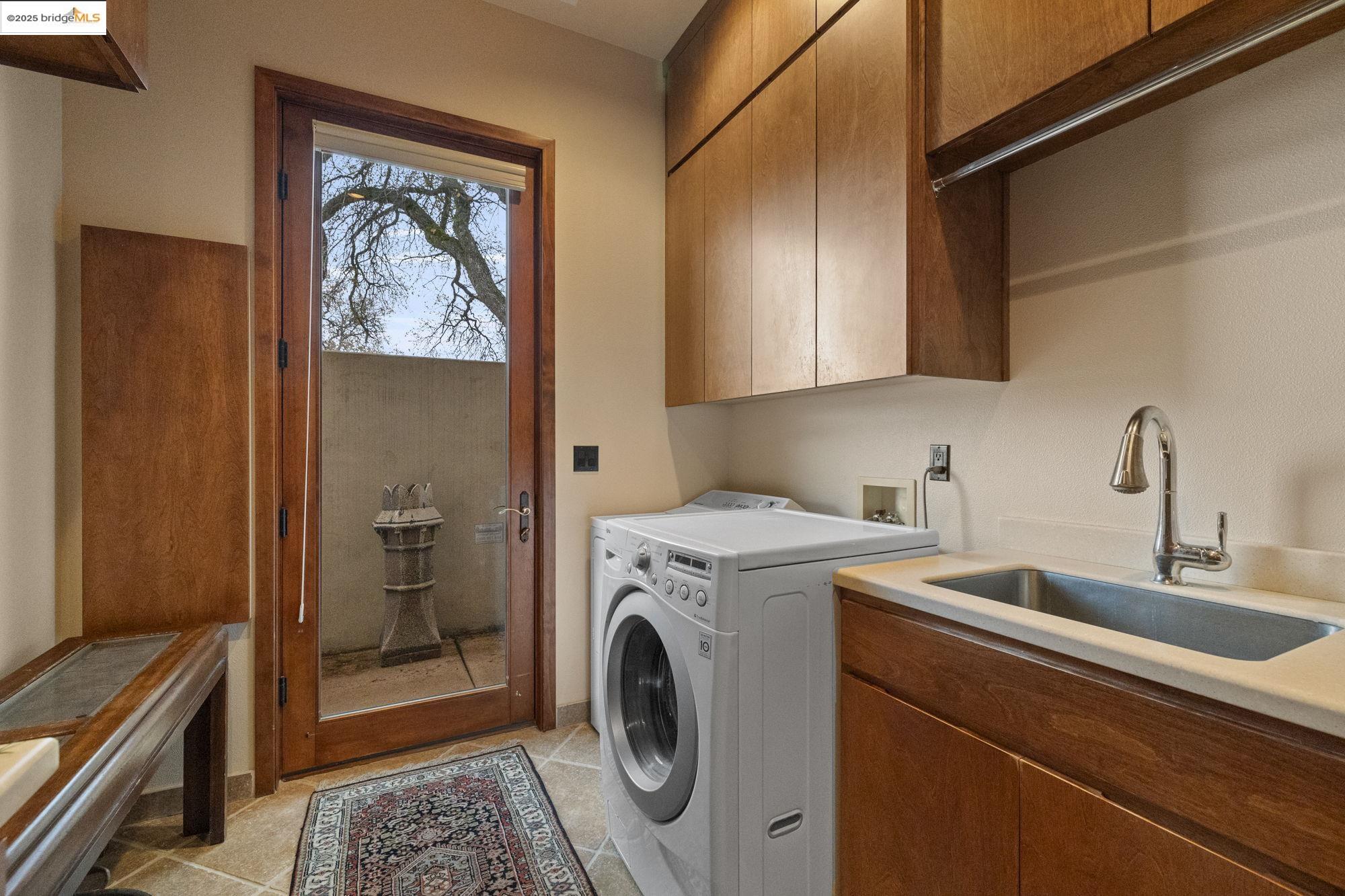 25775 Powell Ranch Road Sonora, CA 95370 - Photo 45 of 60 a utility room with dryer and washer