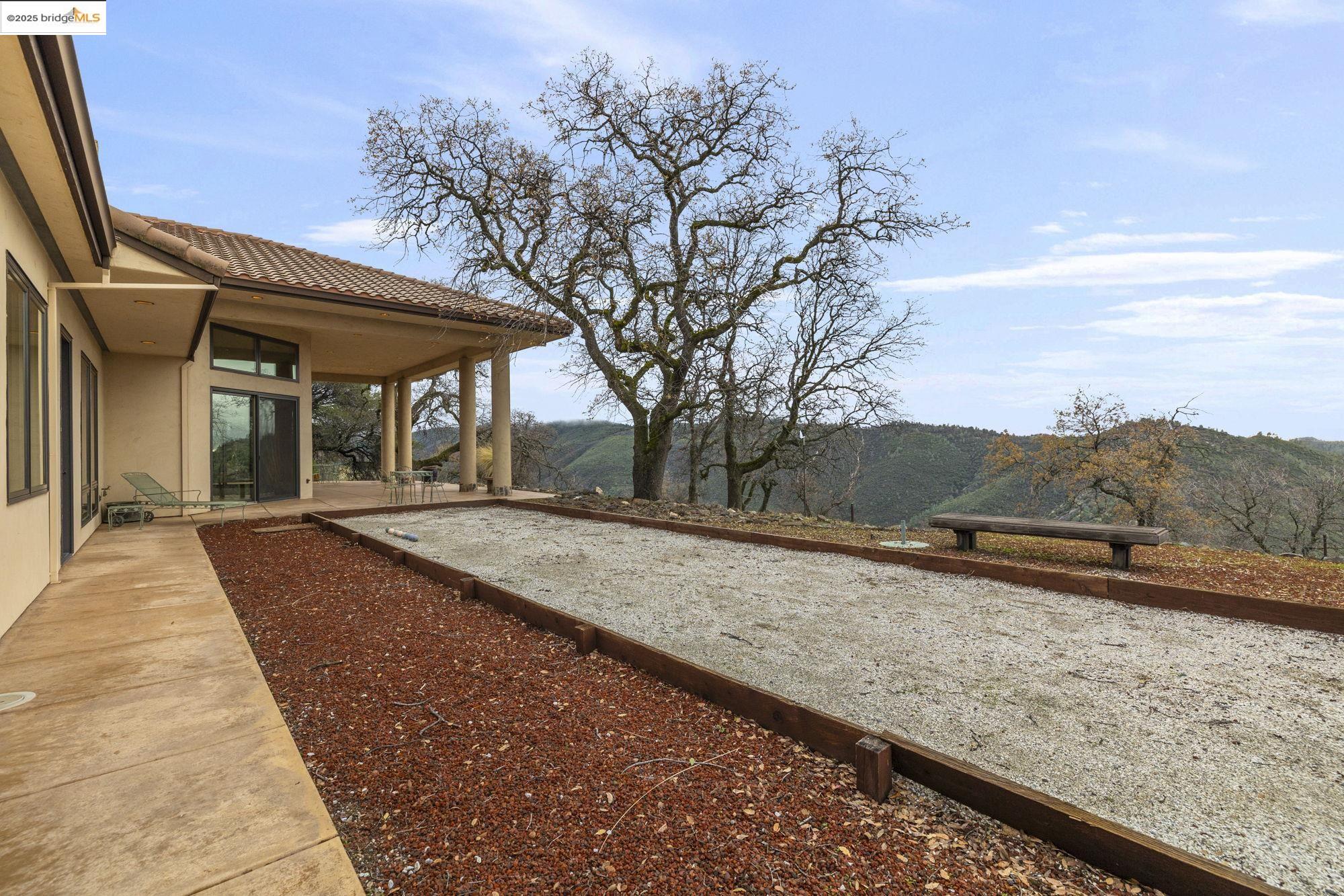 25775 Powell Ranch Road Sonora, CA 95370 - Photo 50 of 60 a view of a house with a yard