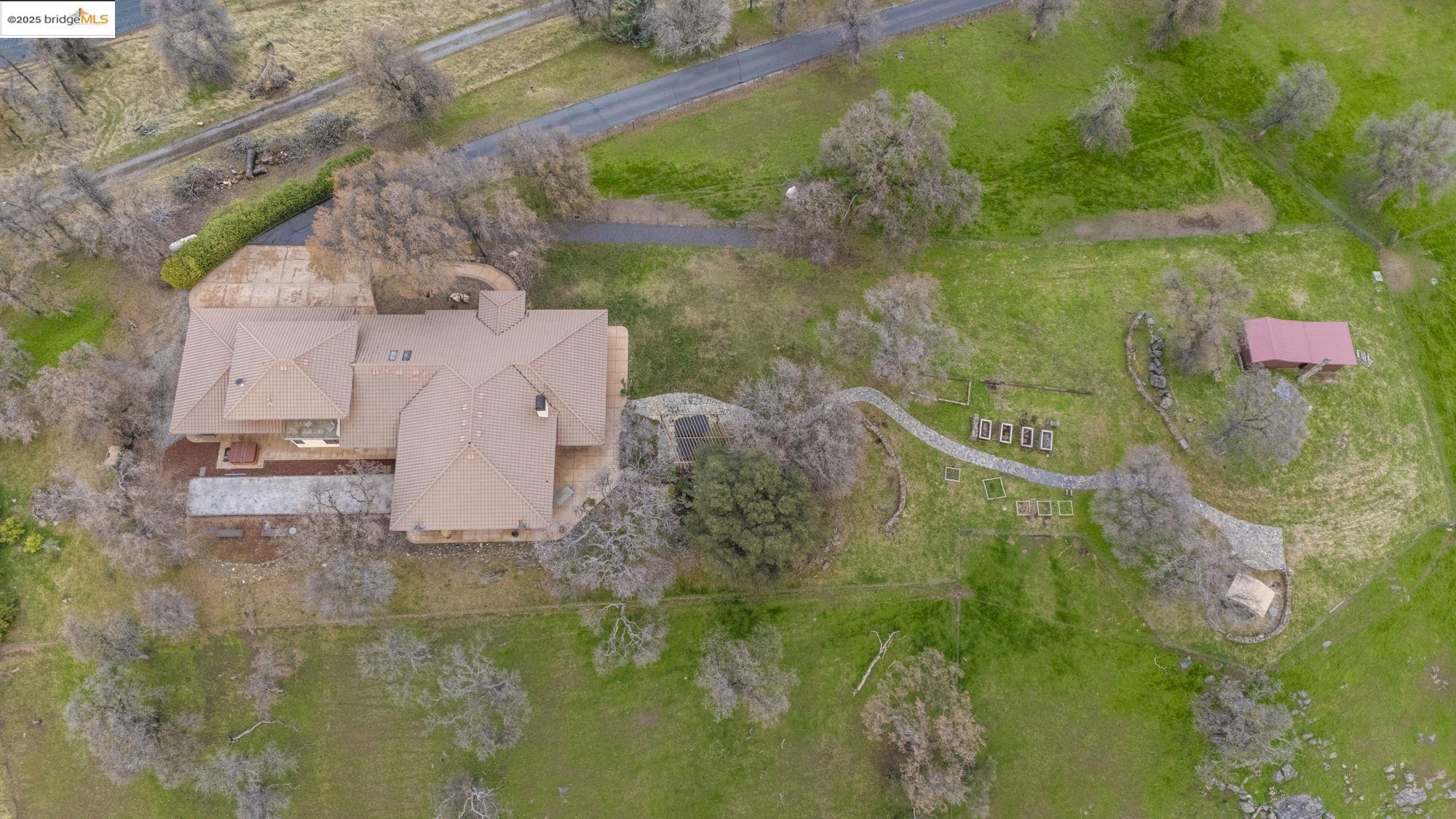 25775 Powell Ranch Road Sonora, CA 95370 - Photo 59 of 60 a aerial view of a house with a yard