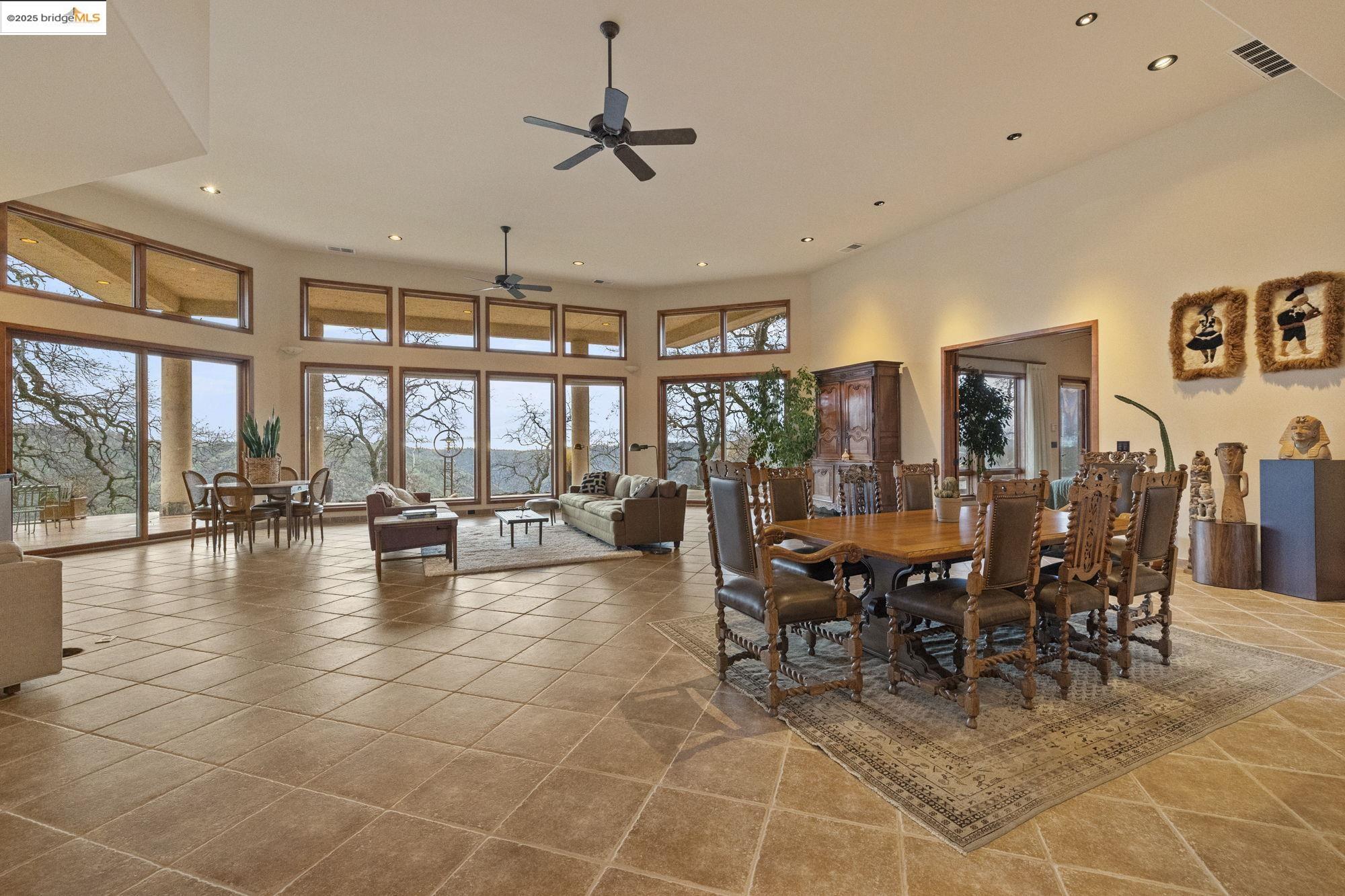 25775 Powell Ranch Road Sonora, CA 95370 - Photo 10 of 60 a view of a dining room with furniture window and outside view