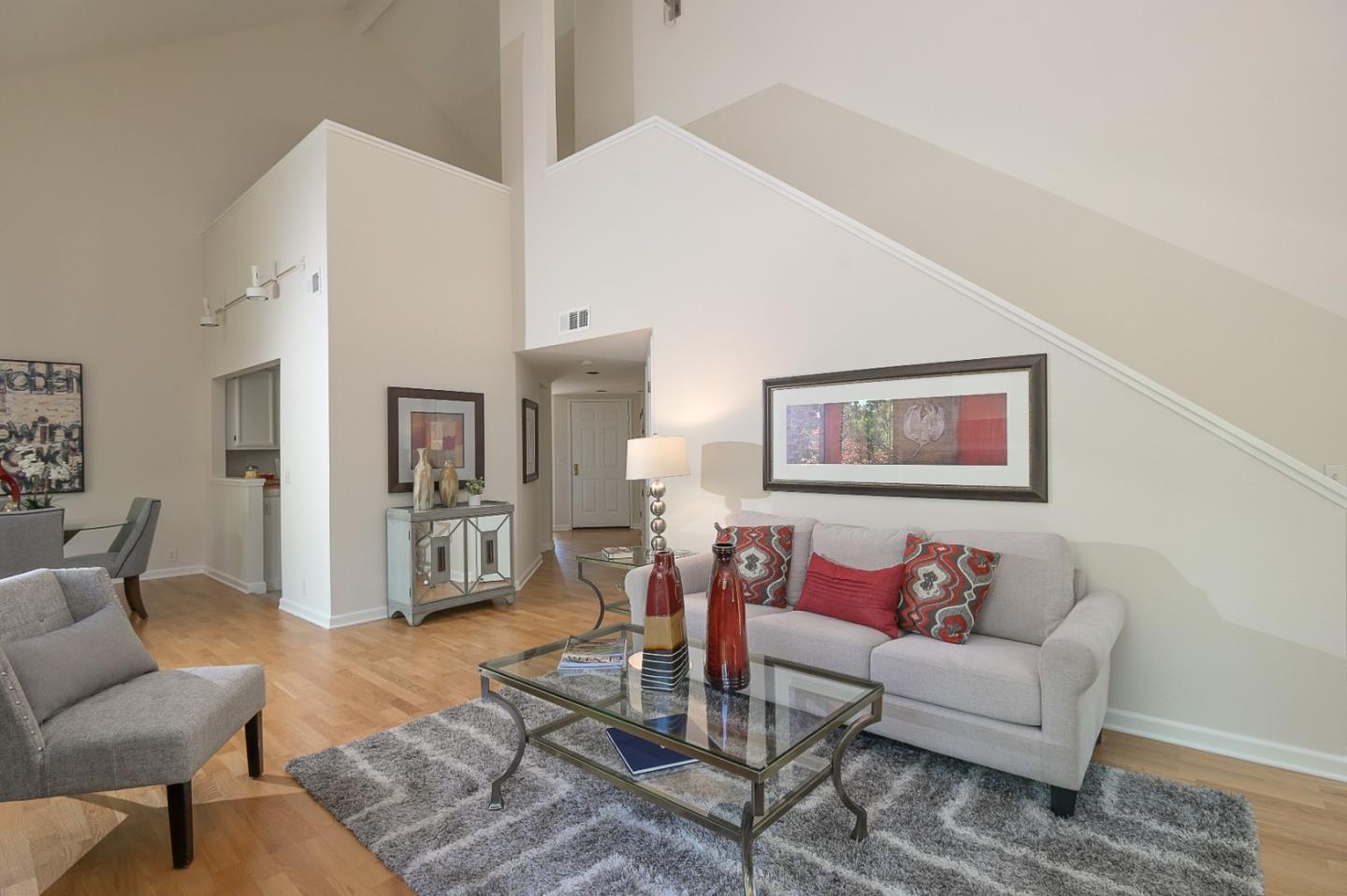 78 Peter Coutts Circle Stanford, CA 94305 - Photo 3 of 12 a living room with furniture and wooden floor