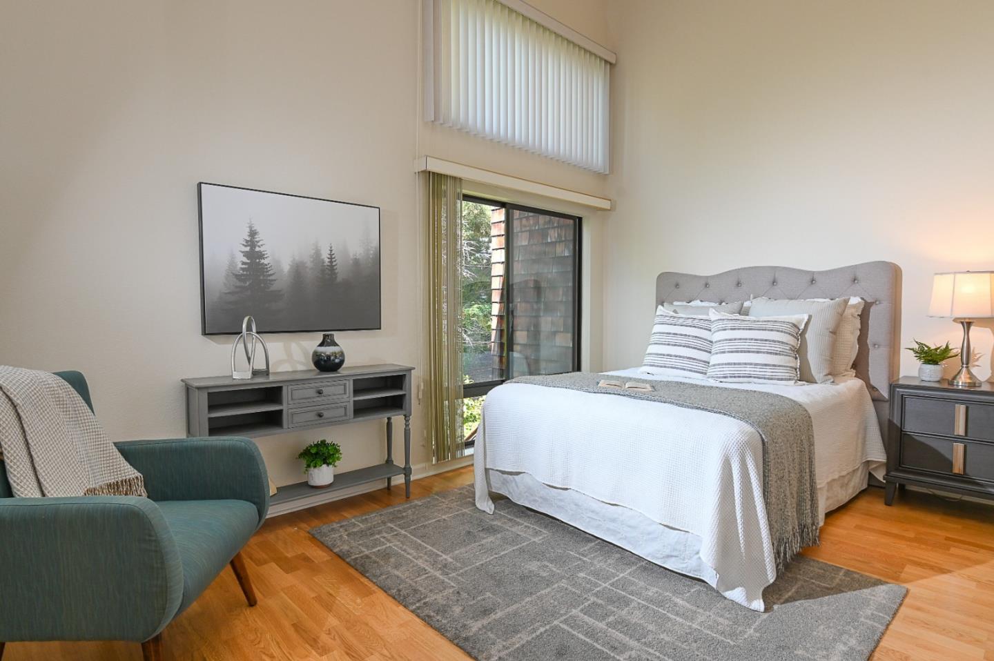 78 Peter Coutts Circle Stanford, CA 94305 - Photo 6 of 12 a bedroom with a bed and a flat screen tv