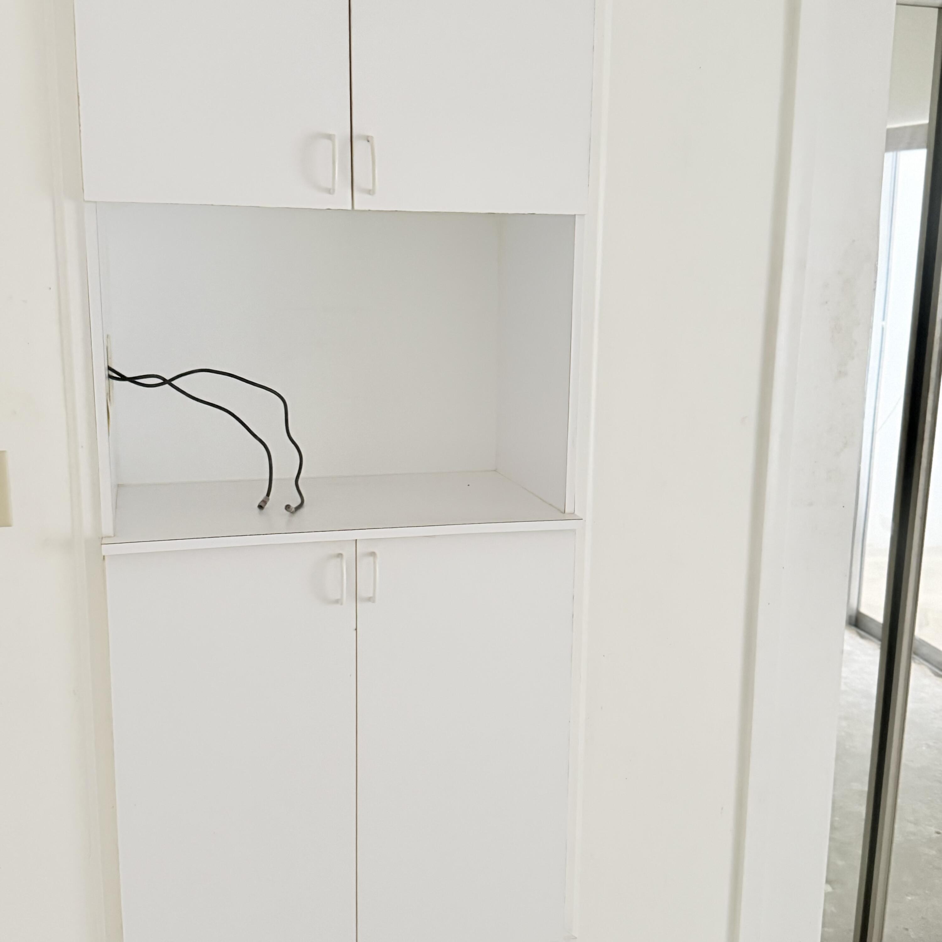 20 Southeast 13th Street, Unit A2 Boca Raton, FL 33432 - Photo 10 of 21 Built in for TV in Bedroom
