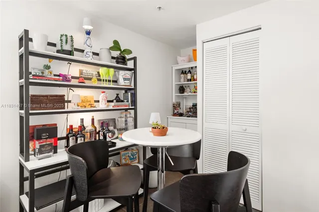 a kitchen with cabinets and window