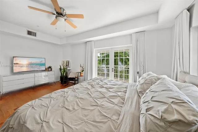 a bedroom with furniture and a table