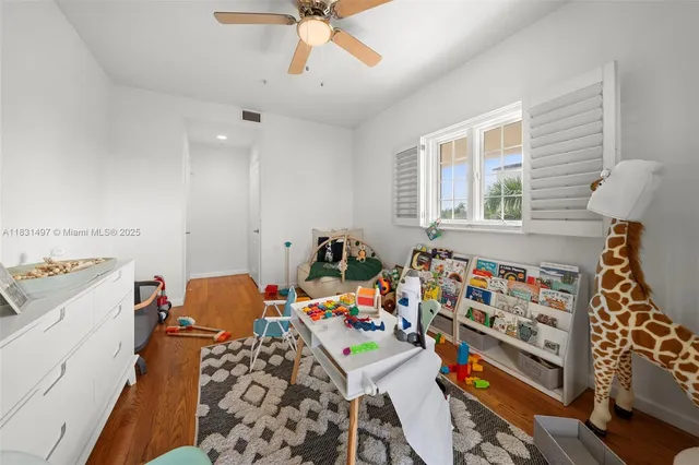 a view of a balcony with lake view and wooden floor