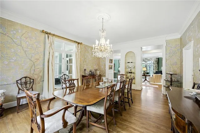 a bathroom with a sink and mirror with toilet