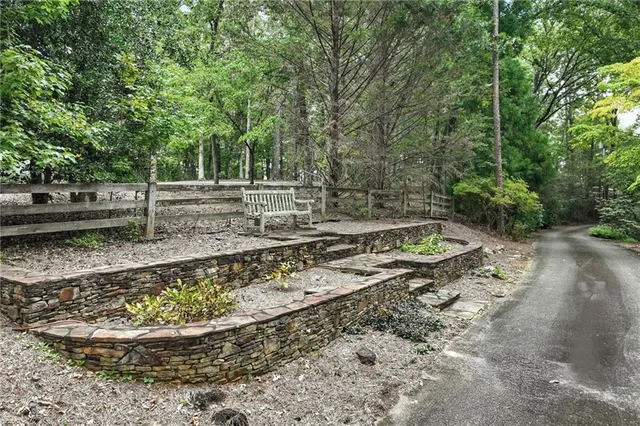 a view of a backyard with a small fountain