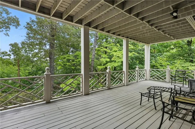 a view of balcony with wooden floor