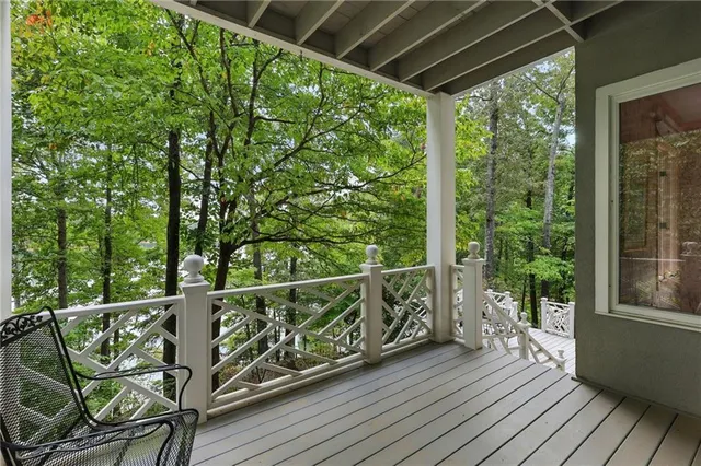 an aerial view of residential houses with outdoor space and river