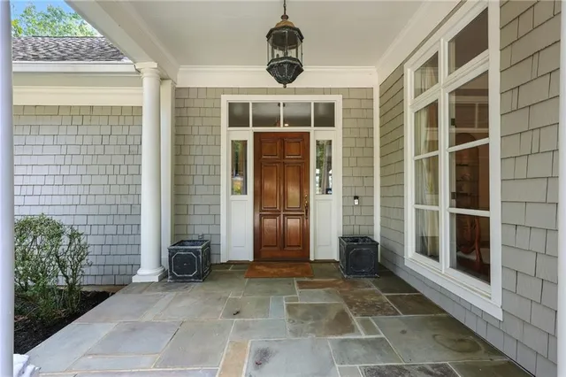 a front view of a house with a shower