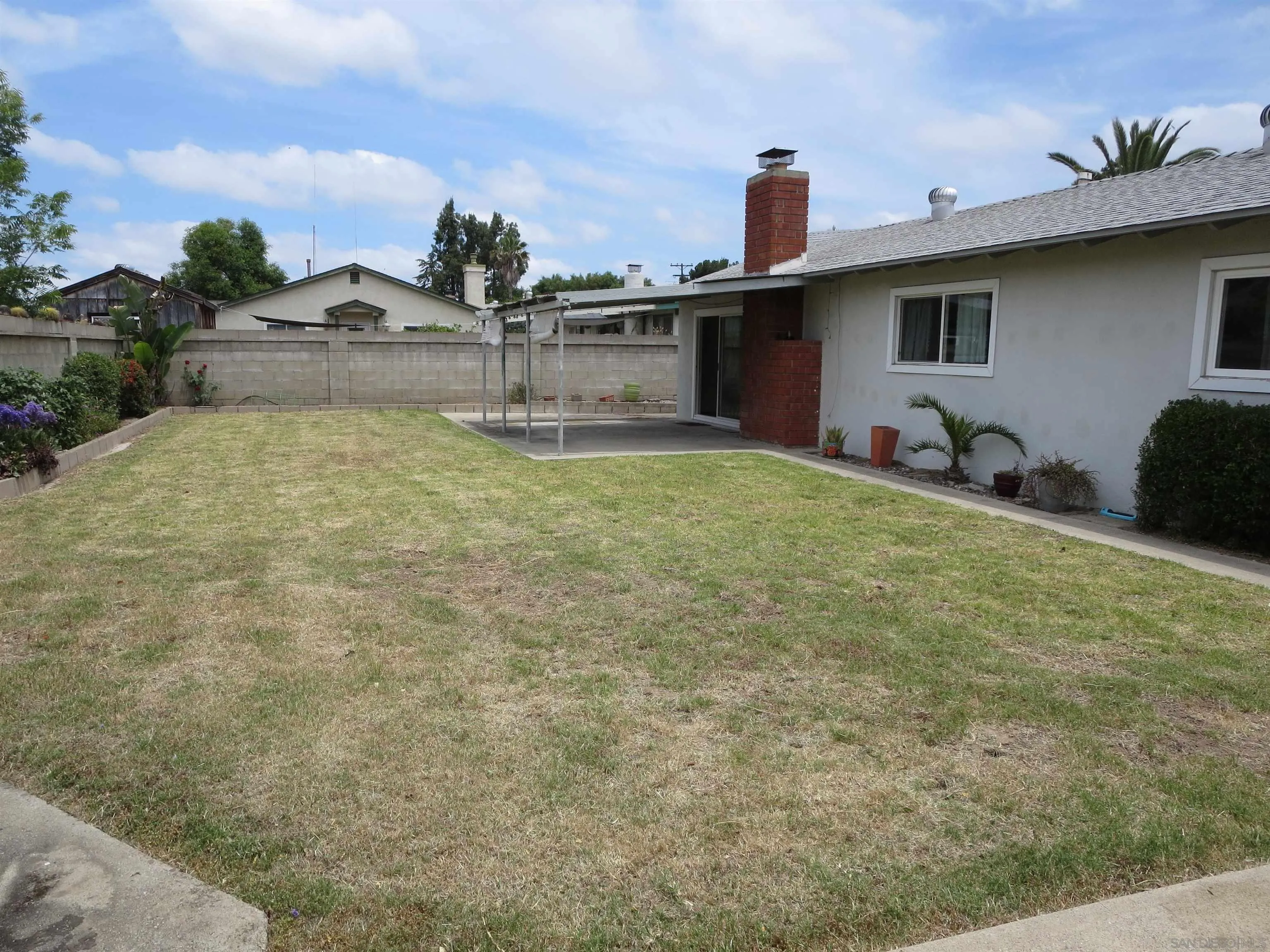 13516 Frame Road Poway, CA 92064 - Photo 32 of 39 a view of a house with backyard and entertaining space
