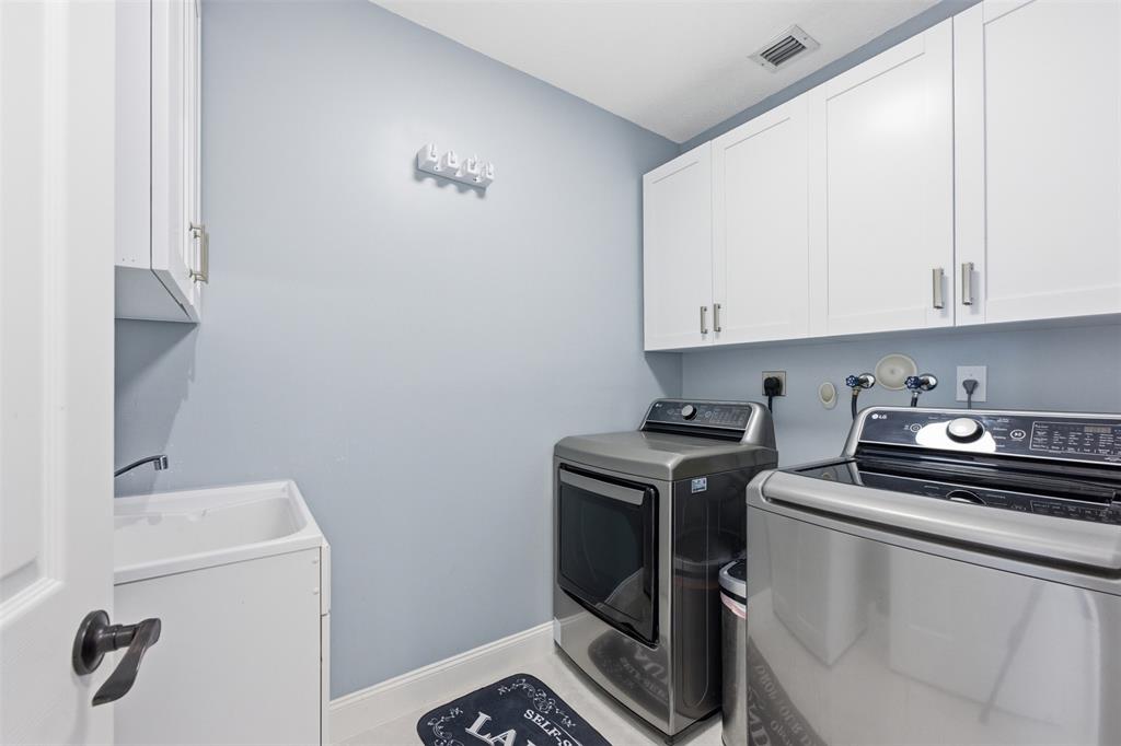 17331 Southwest 33rd Street Miramar, FL 33029 - Photo 26 of 53 a utility room with dryer and washer