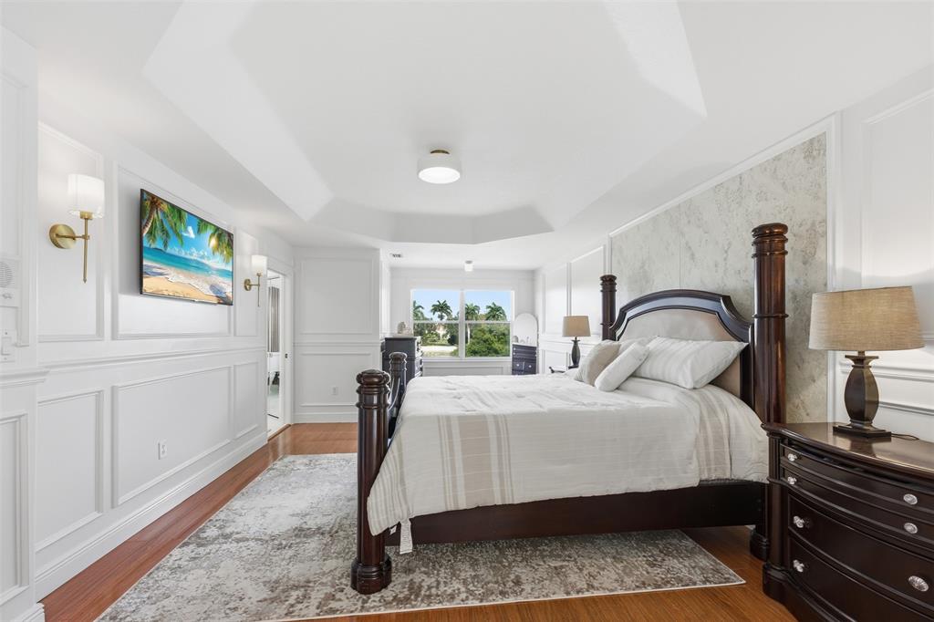 17331 Southwest 33rd Street Miramar, FL 33029 - Photo 33 of 53 a bedroom with a bed and wooden floor