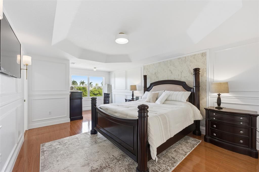 17331 Southwest 33rd Street Miramar, FL 33029 - Photo 34 of 53 a bedroom with a bed and a dresser