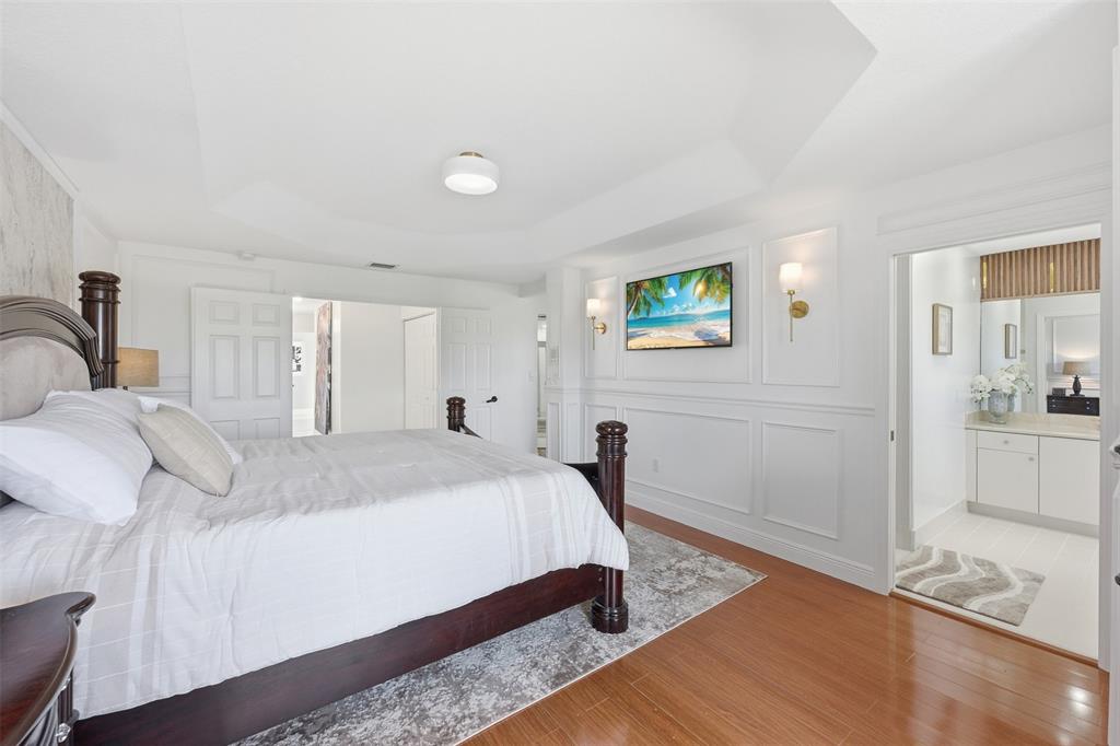 17331 Southwest 33rd Street Miramar, FL 33029 - Photo 36 of 53 a bedroom with a bed and view of living room