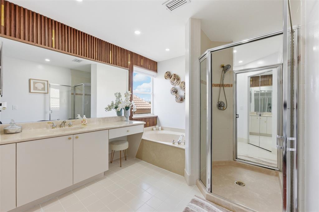 17331 Southwest 33rd Street Miramar, FL 33029 - Photo 41 of 53 a bathroom with a shower sink and mirror