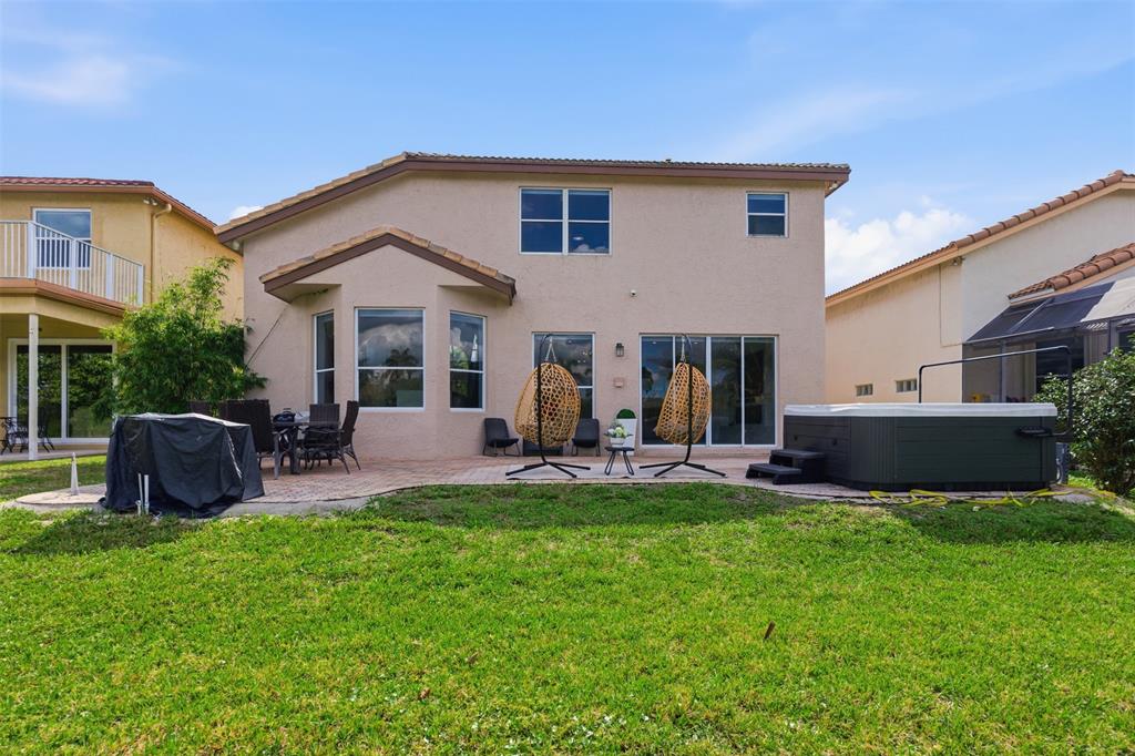 17331 Southwest 33rd Street Miramar, FL 33029 - Photo 51 of 53 a view of a house with a backyard and sitting area
