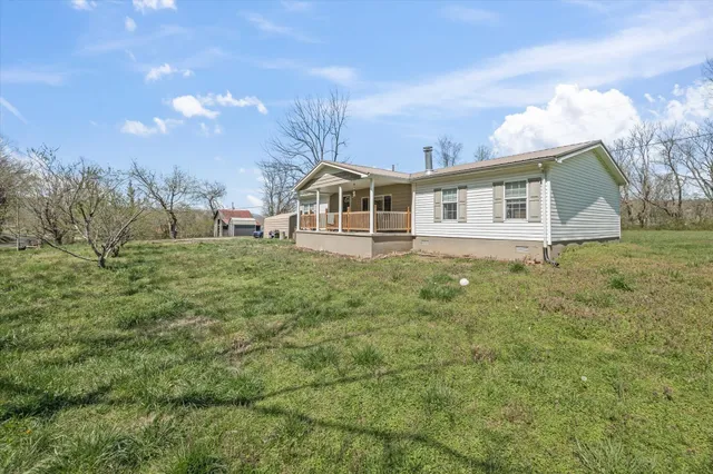 a big house with a big yard and more windows
