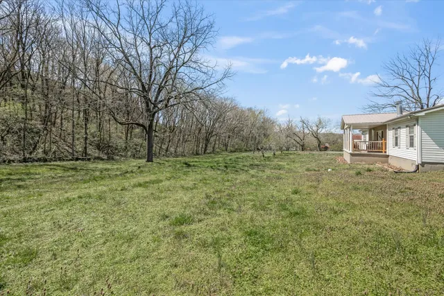 a house view with backyard space