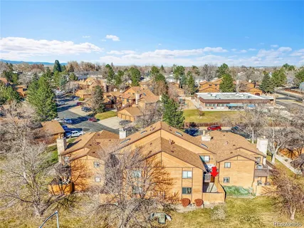 an aerial view of residential building with parking space