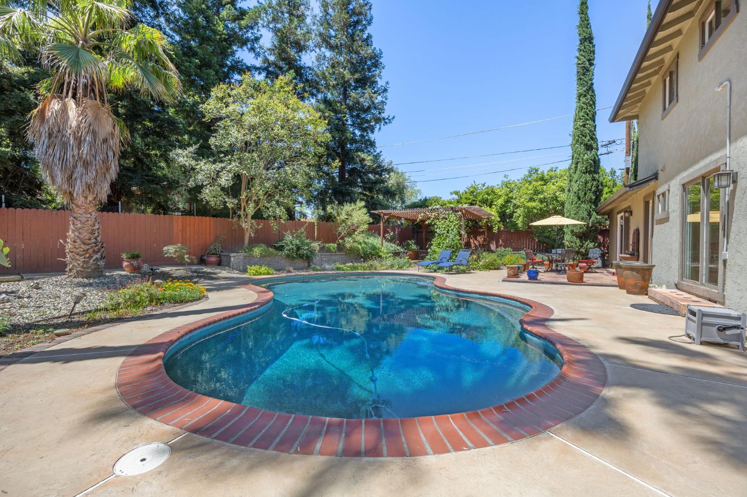 4206 Zephyr Way Sacramento, CA 95821 - Photo 34 of 45 a view of a swimming pool with an outdoor space
