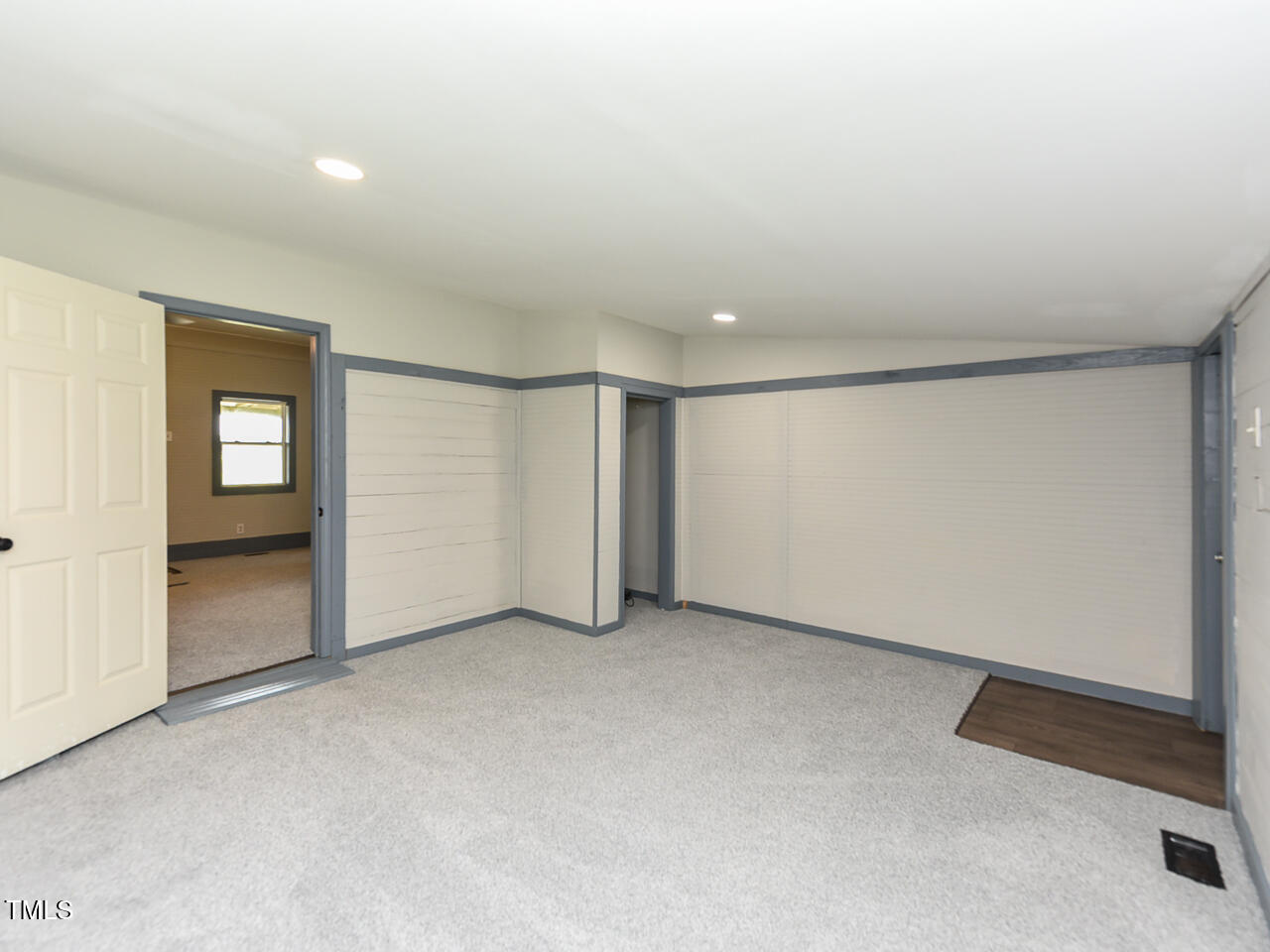 232 Mitchell Farm Road Goldsboro, NC 27530 - Photo 11 of 82 an empty room with windows