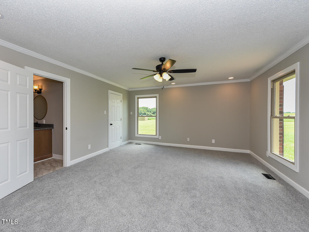 232 Mitchell Farm Road Goldsboro, NC 27530 - Photo 29 of 82 a view of an empty room with a window