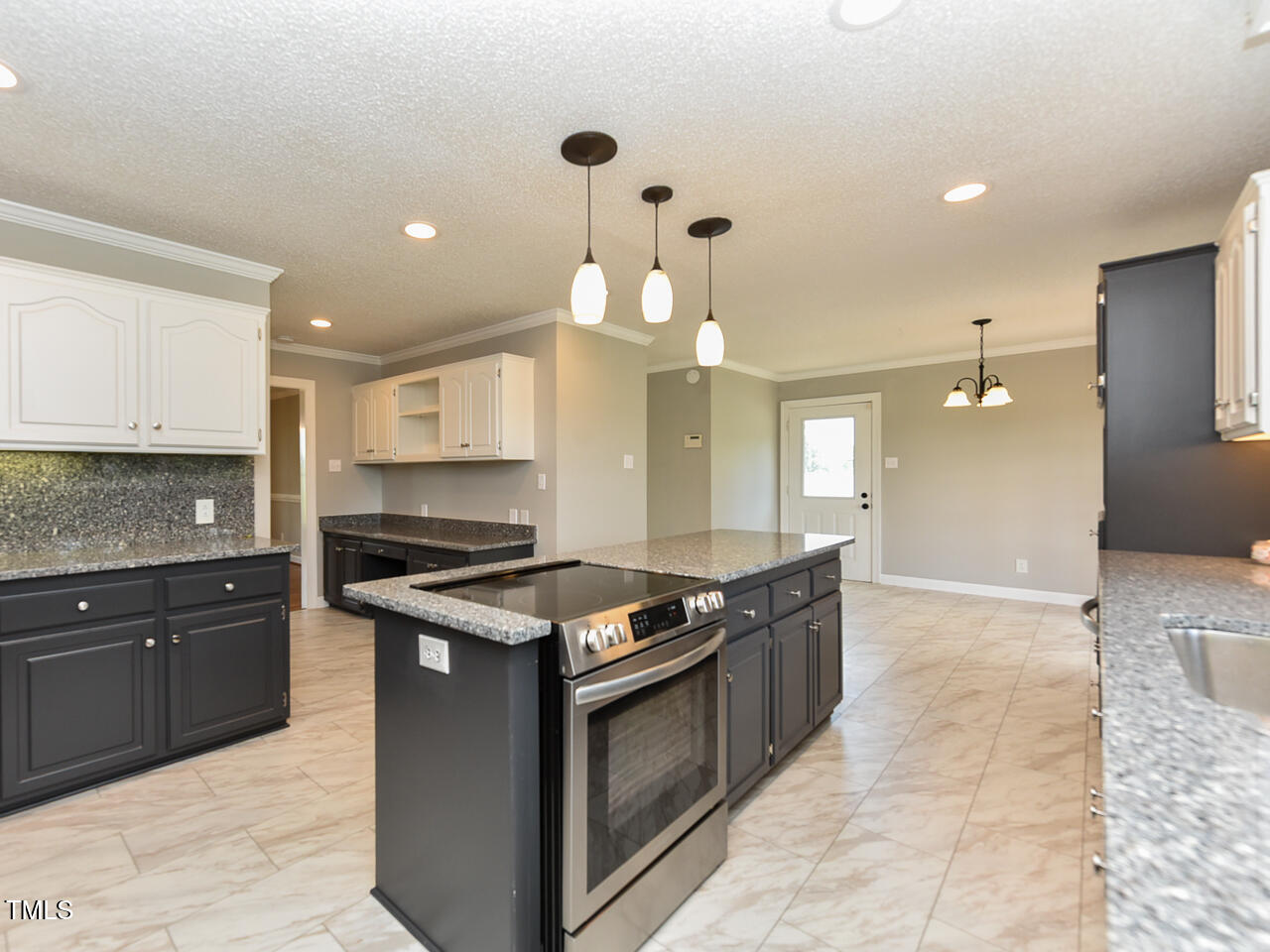 232 Mitchell Farm Road Goldsboro, NC 27530 - Photo 42 of 82 a kitchen with a stove and a sink