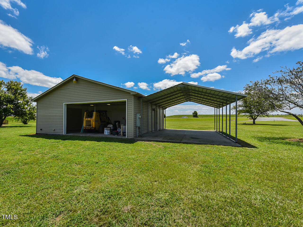 232 Mitchell Farm Road Goldsboro, NC 27530 - Photo 52 of 82 a view of a house with a yard and entertaining space