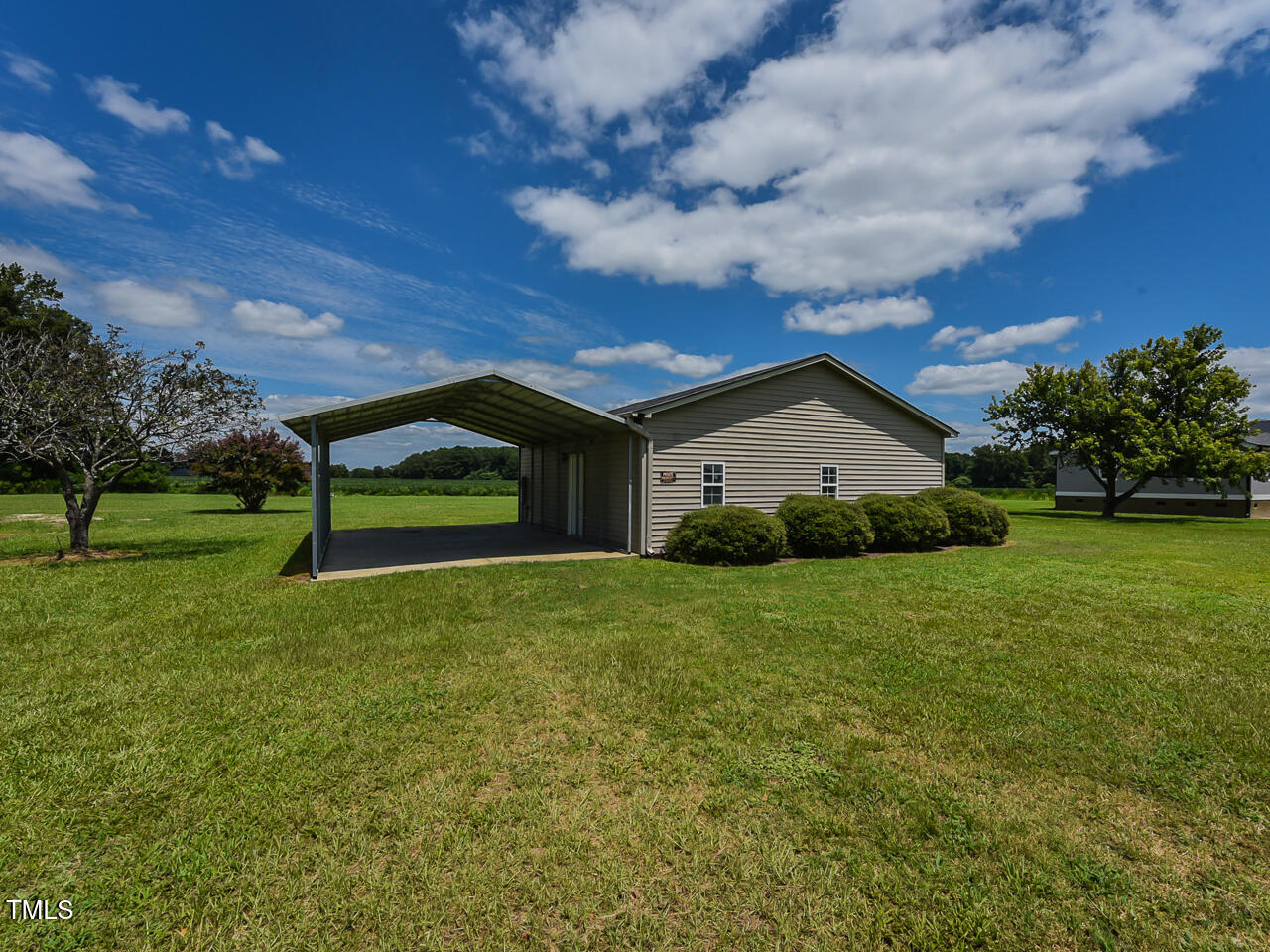 232 Mitchell Farm Road Goldsboro, NC 27530 - Photo 53 of 82 a view of a house with a yard