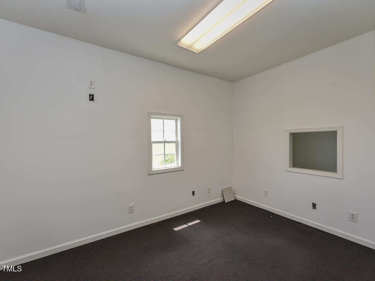 232 Mitchell Farm Road Goldsboro, NC 27530 - Photo 55 of 82 a view of an empty room with a window