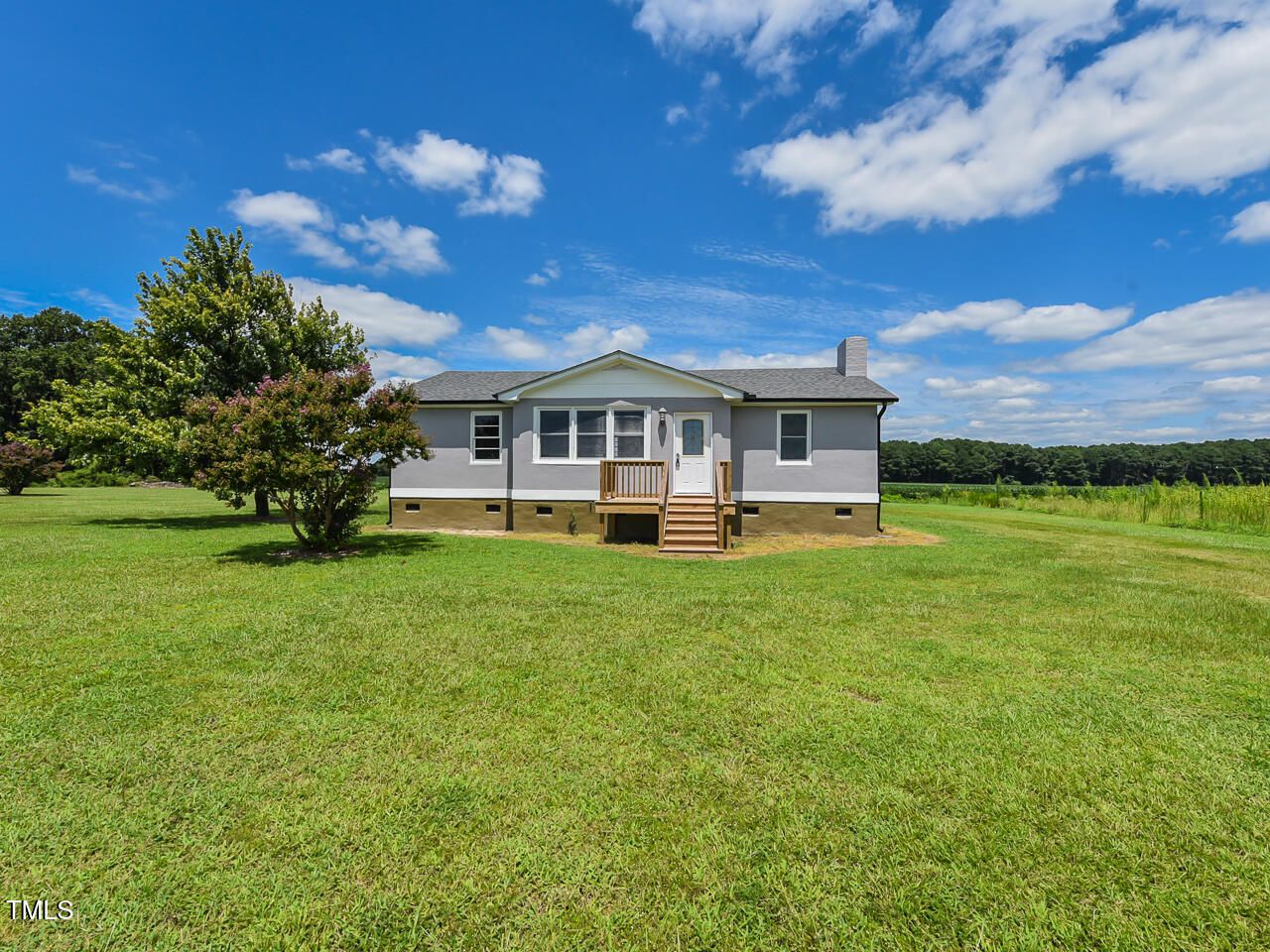 232 Mitchell Farm Road Goldsboro, NC 27530 - Photo 57 of 82 a view of a house with a big yard
